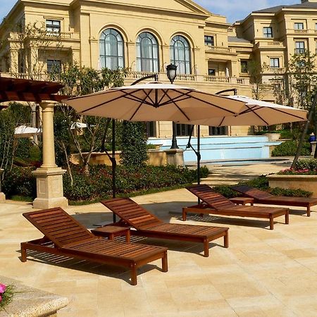 Landison Green Town Hotel Xinchang Bagian luar foto