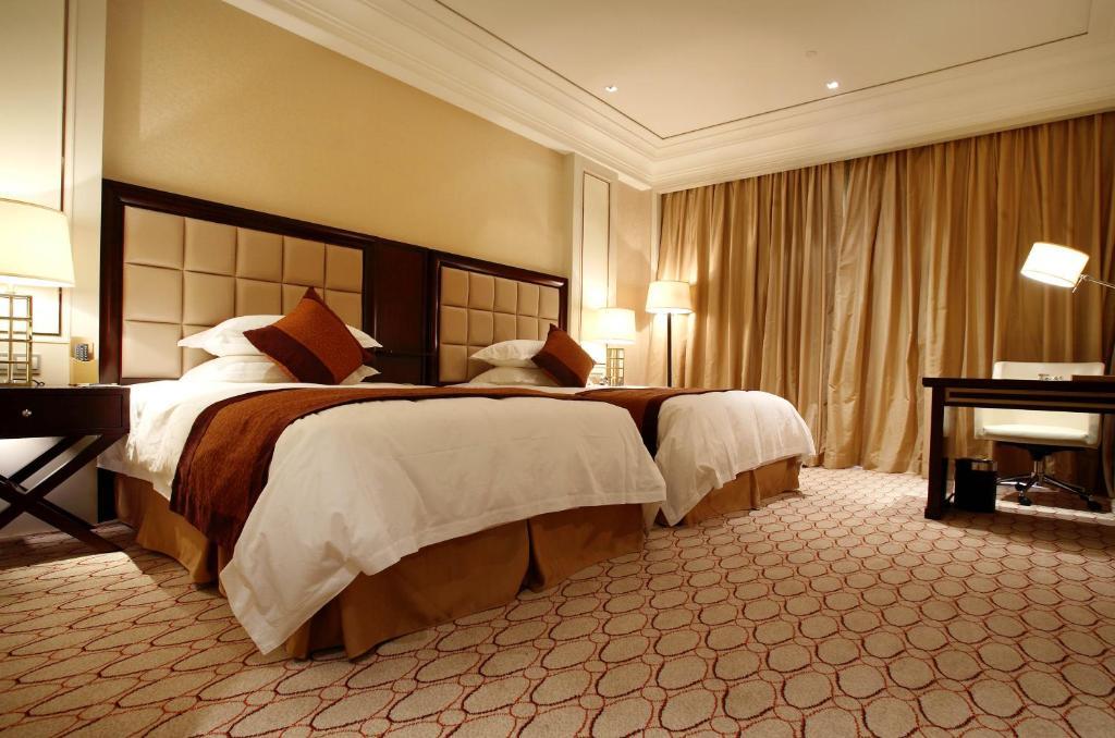 Landison Green Town Hotel Xinchang Ruang foto