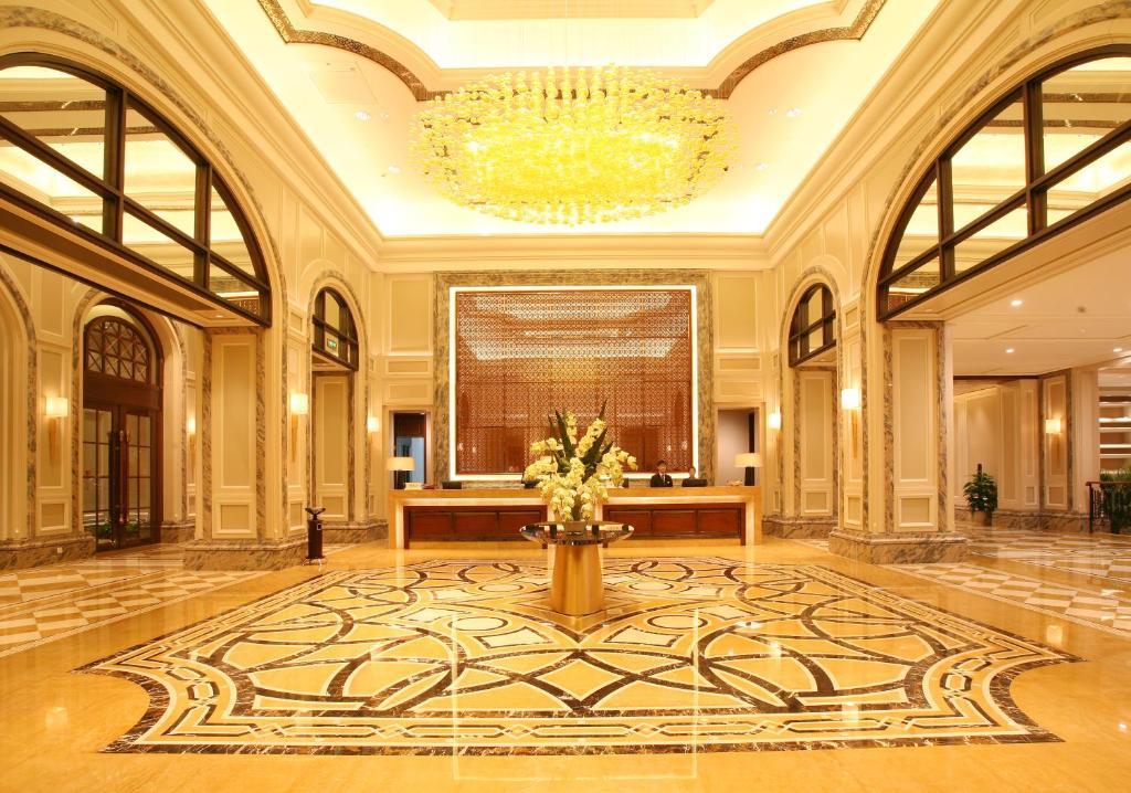 Landison Green Town Hotel Xinchang Bagian luar foto