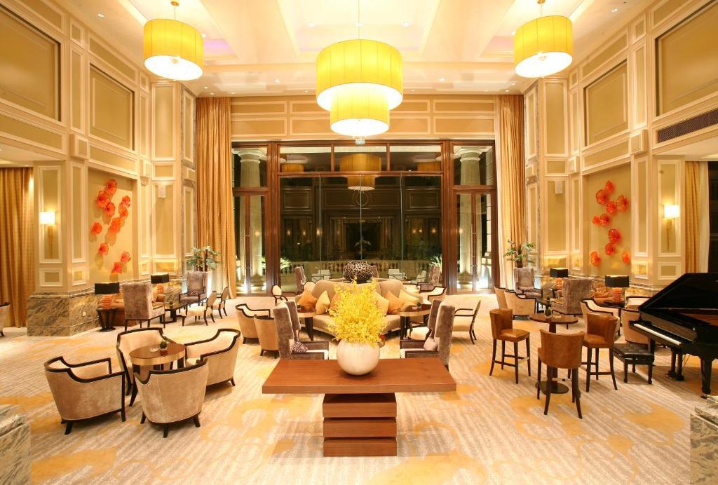 Landison Green Town Hotel Xinchang Bagian luar foto