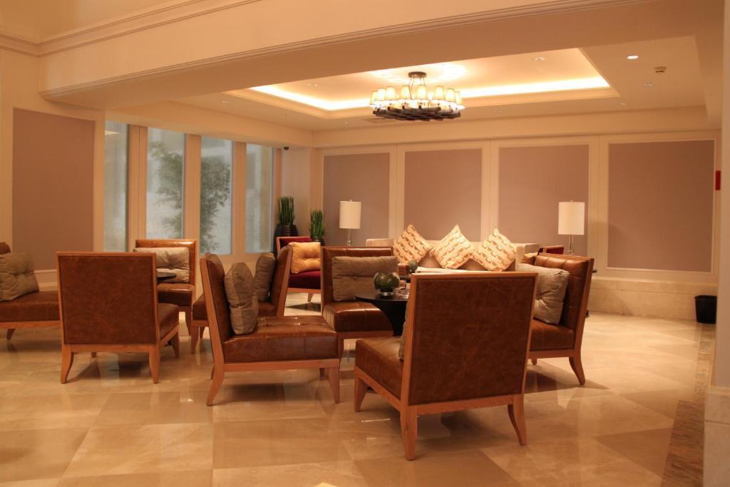 Landison Green Town Hotel Xinchang Bagian luar foto