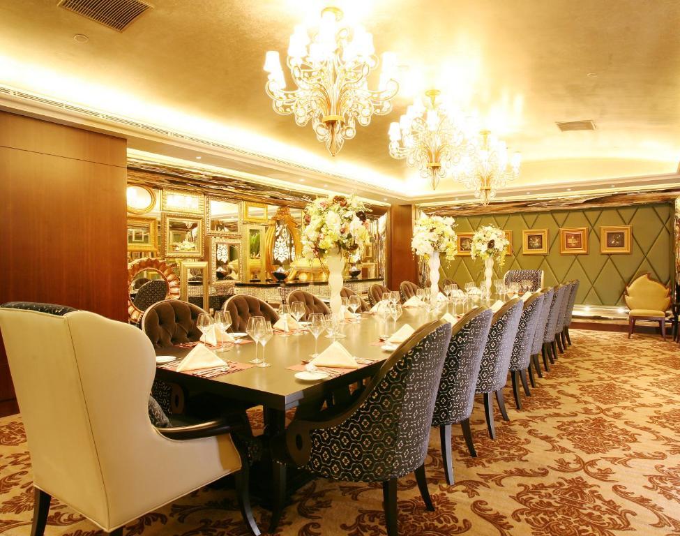 Landison Green Town Hotel Xinchang Bagian luar foto