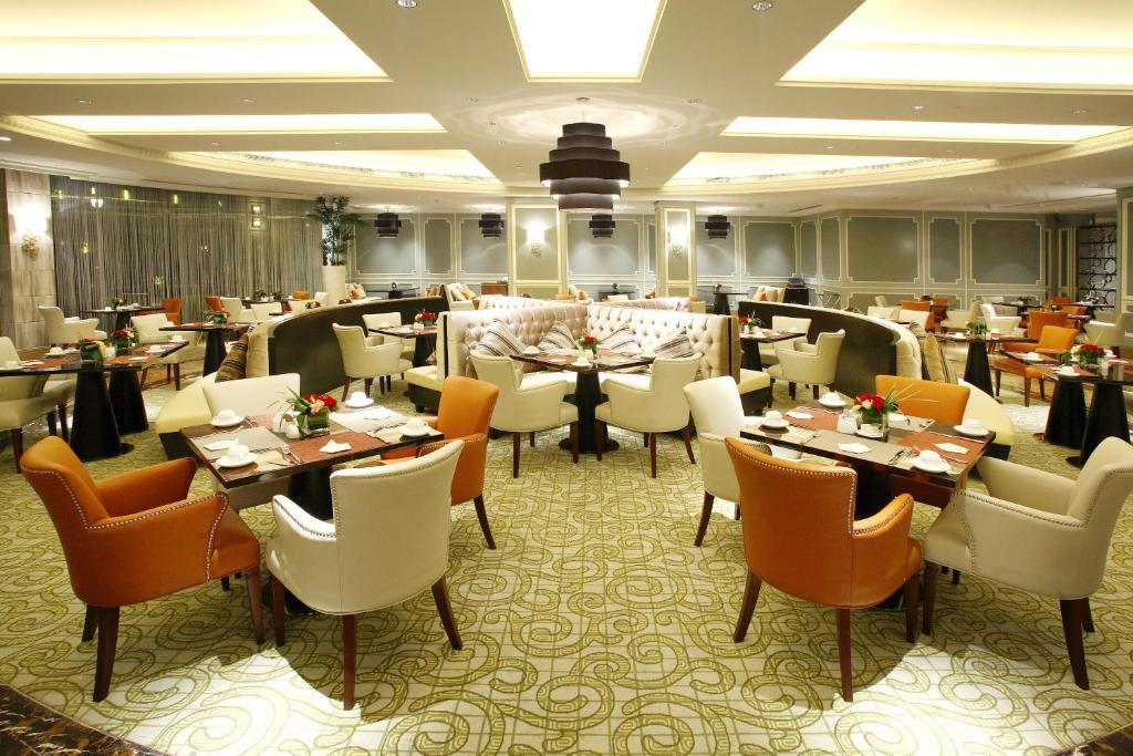 Landison Green Town Hotel Xinchang Bagian luar foto