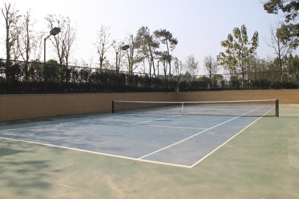 Landison Green Town Hotel Xinchang Bagian luar foto