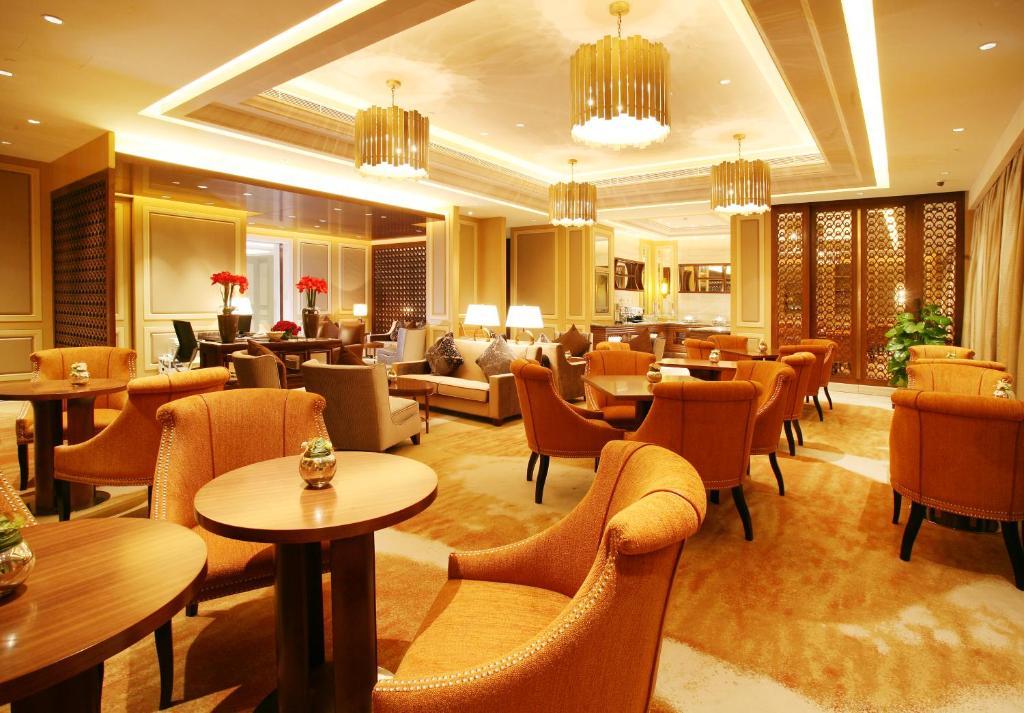 Landison Green Town Hotel Xinchang Bagian luar foto