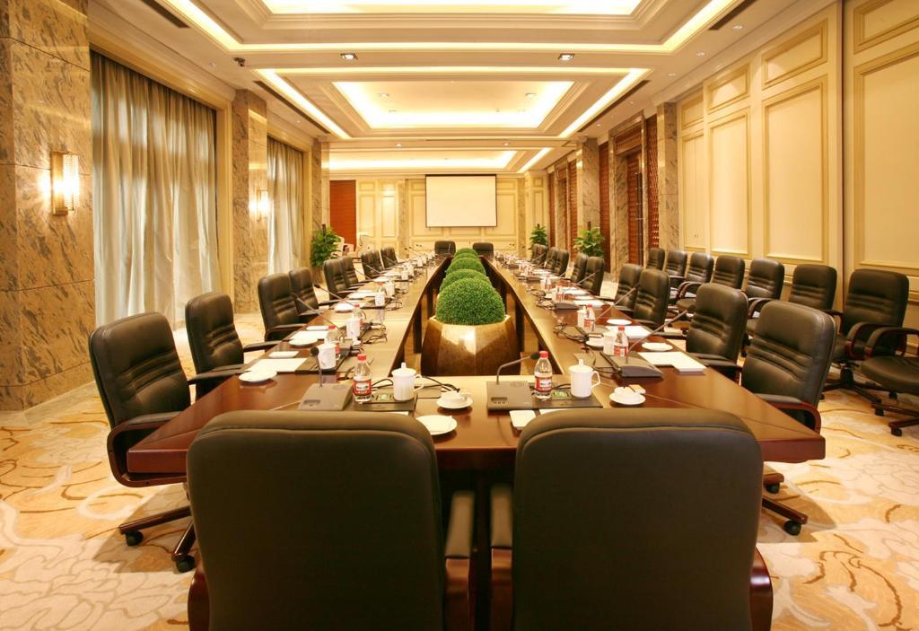 Landison Green Town Hotel Xinchang Bagian luar foto