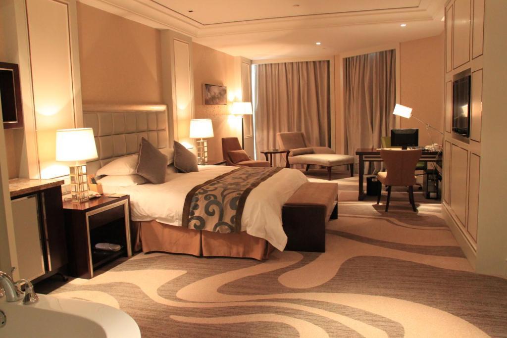 Landison Green Town Hotel Xinchang Ruang foto